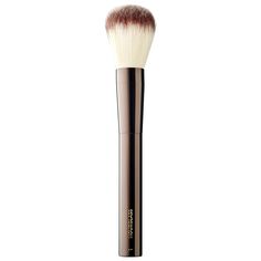 A large, round face-powder brush. This multitasking brush is excellent for applying and blending both loose and pressed powder as well as foundation. The sculpted head allows for precise product-placement.. Hourglass designed their makeup brush collection to be supremely soft, decidedly luxurious, and PETA-friendly. Takelon bristles are made from high-grade synthetic fibers to maximize product application, avoid potential allergic reactions to animal fur, and promote the use of non-animal produc Hourglass Powder, Contour Wand, Sculpted Head, Wand Shop, Liquid Contour, Hourglass Makeup, Performance Makeup, Makeup Swatches, Concealer Brush