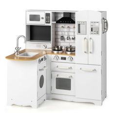 a white toy kitchen with sink, oven and microwave