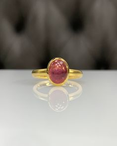 Natural Pink Tourmaline Ring * Dainty Cabachon Ring * Genuine Tourmaline & 14K Solid Gold * Best Gift for Her/Him * Handmade Ring ◎ Details ◎ ○ Gemstone Details .Natural PINK TOURMALINE Oval Cut 9X7 mm approx. 2.09 ct ○ Gold Details 14K Solid Gold Width of Band : 2.50 mm Weight of Ring : approx 3.80 gr Made to Order HANDMADE ITEM ○ Upgrade to Solid 18K Gold, please click the link below: https://www.etsy.com/listing/962826004 For more CABACHON BEZEL rings : http://etsy.me/37fvI60 All of our j Heirloom Gold Tourmaline Ring, Gold Oval Tourmaline Ring, Gold Tourmaline Gemstone Rings, Gold Tourmaline Rings, Yellow Gold Tourmaline Birthstone Ring Gift, Classic Gold Tourmaline Rings, Gold Tourmaline Birthstone Ring Gift, Tourmaline Bezel-set Oval Cabochon Ring, Tourmaline Bezel Set Ring In Oval Cabochon