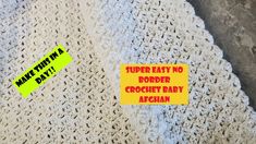 a crochet baby afghan with a yellow sticker that says super easy no border crochet baby afghan