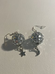 Cute lil' Disco balls that bring the sparkle at any occasion Disco Style Silver Jewelry For Party, Silver Moon-shaped Party Jewelry, Silver Moon Shaped Jewelry For Party, Silver Moon-shaped Jewelry For Party, Celestial Sparkling Jewelry For Party, Celestial Round Jewelry For Parties, Moon Shaped Party Earrings For Pierced Ears, Moon Shaped Earrings For Party, Nickel-free Moon Shaped Party Jewelry