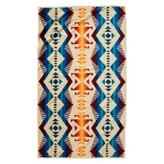 an orange, blue and white rug on a white background