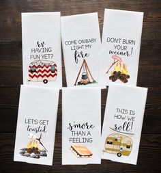 four tea towels with camper sayings on them