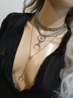 This handmade chunky stainless steel chain layered necklace set is a stunning piece of jewelry that is perfect for those who love bold and edgy accessories. The necklace features two necklaces, one thick chunky cover in an adjustable length, and a 4-strand drop festoon design, adding depth and dimension to the piece with a shiny Fang or cat's claw pendant.  The chunky chain is made of sturdy stainless steel, ensuring its durability and longevity.  This necklace set is an excellent handmade gift for someone special. It is a perfect choice for those who love alternative and goth styles, as well as anyone who wants to make a statement with their jewelry. It runs from 15 to 18 inches in length with a built-in extender. The necklace is waterproof and sweatproof and will never tarnish or fade! 2 Trendy Metal Necklace With Moon Charm, Trendy Silver Moon Jewelry, Trendy Silver Jewelry With Moon Charm, Silver Layered Necklace With Moon Charm As A Gift, Silver Layered Necklace With Moon Charm For Gift, Silver Layered Moon Charm Necklace For Gift, Trendy Silver Necklace With Moon Charm, Trendy Metal Jewelry With Moon Charm, Trendy Metal Moon Charm Jewelry