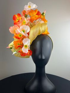 Beautiful sunny yellow abaca silk twisted gorgeously and crowned with loads of orange, blush and white poppies.  Sits on a comfortable goldheadband. Ships in a high quality storage box. One of a kind.  Perfect for Kentucky Derby, Royal Ascot, church, weddings, just for fun. Summer Flower Headband For Garden Party, Yellow Spring Headband, Yellow Headband For Summer Wedding, Summer Garden Party Headband With Handmade Flowers, Elegant Orange Headpiece For Spring, Yellow Summer Wedding Headband, Multicolor Headpieces For Spring Garden Party, Spring Garden Party Multicolor Headpieces, Orange Summer Headband Fascinator