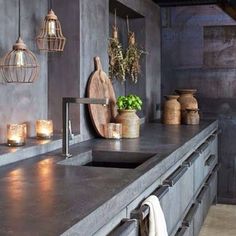 a kitchen counter with candles on it and an instagramr above the counter top