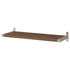 a wooden shelf with metal brackets on it