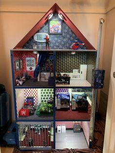 a doll house with lots of toys in it