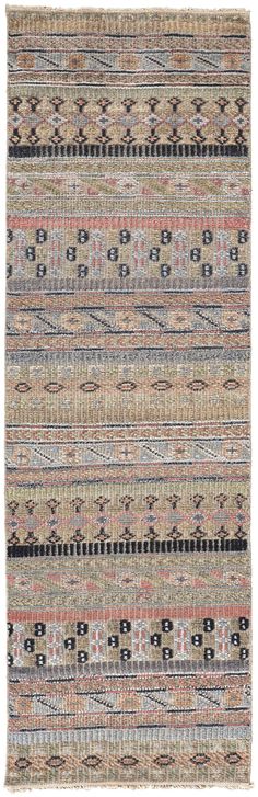 a multicolored rug with different patterns and colors on the side, including stripes