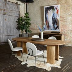 an image of a dining room setting with the words west elm above it and below it