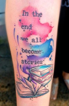 a person with a tattoo on their leg that says in the end we all become stories