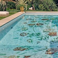 a pool with flowers painted on it