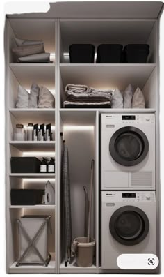 an image of a washer and dryer in a closet with clothes on the shelves