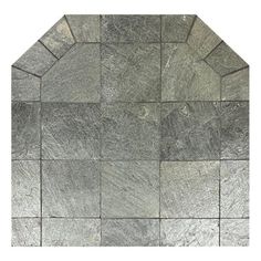 a gray stone wall with several different shapes and sizes, including hexagonal tiles