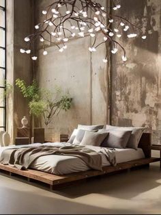 a bedroom with a large bed and lots of lights hanging from the ceiling