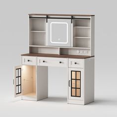 a dollhouse desk with a microwave on top and cupboard doors open to reveal a kitchenette