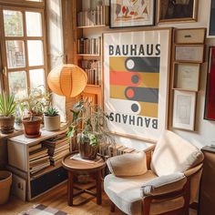 a living room filled with furniture and lots of plants on top of bookshelves