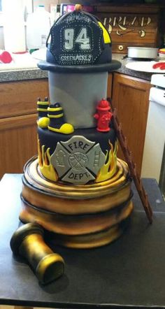 a birthday cake made to look like a fireman's hat