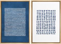 two blue and white paintings with dots on the bottom, one in gold framed art