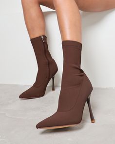 Combining a classic fit with light textures, our Huntley heeled boots are the perfect evening boot option. Designed with a pointed toe, slim, mid-calf height fit, and a stiletto heel, we're obsessed. Style yours with a blazer dress for that effortless day-to-night combination. - Heel measures approximately 4.5 inches/ 11.5cm - Faux leather upper - Model wears UK 6 / EU 39 / US 8 - Fits true to size Pointed Toe Boots, Toe Boots, Women's Heels, Heels Shoes, Blazer Dress, Womens Heels, Stiletto Heel, Chocolate Brown, Mid Calf