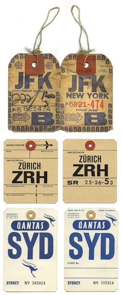 four luggage tags with the names and numbers of different destinations on them, hanging from strings