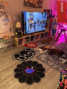 a living room filled with lots of different types of rugs and decor on the floor