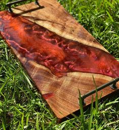 a piece of wood that is laying in the grass