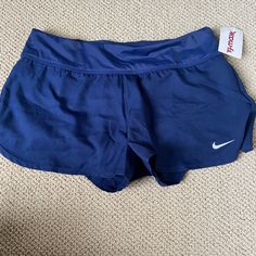 Navy Blue Nike Runner Shorts In Great Condition And Never Worn. Perfect For Going On Runs Or Working Out. Nike Stretch Athletic Shorts For Beach, Nike Blue Shorts For Beach, Nike Workout Bottoms In Blue, Nike Blue Workout Bottoms, Nike Stretch Blue Bottoms, Nike Navy Shorts For Summer, Nike Blue Stretch Bottoms, Nike Cotton Shorts, Nike Runner