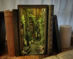 an open book sitting on top of a wooden table