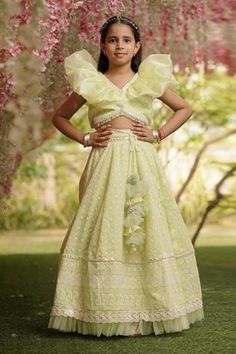 Green choli with ruffled neckline. Paired with embroidered lehenga.
Components:2
Pattern:Embroidered
Type of Work:Floral Motifs
Neckline:V-Neck
Sleeve Length:Statement Sleeves
Fabric:Cotton
Color:Green
Other Details:
Frill hem choli and lehenga
Back tie-up blouse
Occasion:Festive and Wedding - Aza Fashions Western Maxi Dress, Umbrella Lehenga, Lehenga Online Shopping, Plus Size Lehenga, Embroidery Lehenga, Kids Wear Boys, Organza Lehenga, Green Embroidery, Lehenga Online