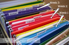 file folders with labeled labels on them are organized in a filing cabinet for the teacher's week