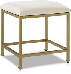 a gold metal stool with a white cushion on the top and bottom part of it