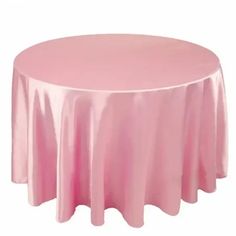 a round table with pink cloth on it