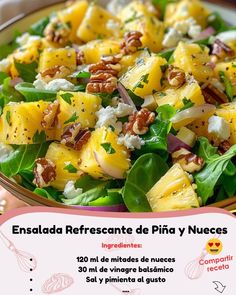 a salad with pineapples, feta cheese and pecans