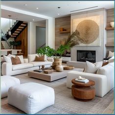 a living room filled with furniture and a fire place in the middle of a room