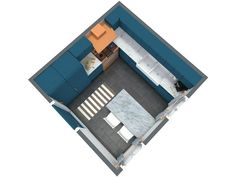 an overhead view of a kitchen and living room in a small apartment with blue walls