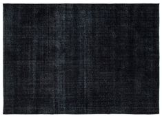 an old black rug is shown on a white background, with no one in it