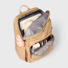 Keep your belongings organized in style with this 17-Inch Top-Load Backpack from Embark™️. This softside backpack features a main zipper compartment with plenty of space for stashing your belongings and a laptop pocket for carrying a laptop up to 15 inches. Multiple zip pockets on the front offer you extra space to stash small items, while a side water bottle pocket adds even more convenience. Plus, adjustable padded shoulder straps and a top handle allow for convenient carrying whether you're h Travel Softback Backpack, Practical Backpack For Travel And Back To School, Functional Travel Backpack With Softback, Functional Laptop Bag For Travel And Back To School, Functional Laptop Bag For Travel And School, Functional Softback Backpack For Travel, Functional Standard Backpack With Large Capacity, Back To School Travel Backpack With Zipper Pocket, Functional Large Capacity Standard Backpack