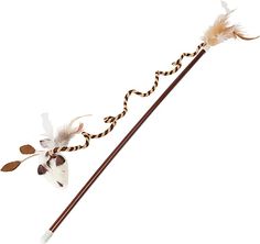 an old fashioned harry potter wand with feathers on it