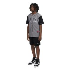 Baseball vibes with a basketball legacy. Showcase your love for both games in the Jordan HBR Baseball Jersey. Made with lightweight fabric, this jersey buttons down the front. It features heat-sealed Jordan and 23 logos on the front and back. Pair it with your AJ1s for a look worth posting on your socials. Button down jersey. Heat-sealed appliques logos at the front and back. Imported. Throwback College Jersey With Team Logo, College Throwback Jersey With Team Logo, Streetwear Jersey With Team Name, Black Casual Basketball Jersey, Throwback Team-colored Cotton Baseball Jersey, Throwback Team-colored Cotton Jersey, Varsity Basketball Jersey Tops, College Throwback Baseball Jersey With Team Logo, Throwback Jersey For College During Baseball Season