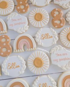 decorated cookies are arranged on a table