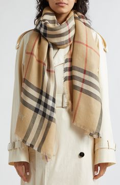 The brand's iconic check is rendered in two subtly different palettes at an enlarged scale on this reversible, generously sized scarf of gauzy wool and silk. 86 1/2" x 27 1/2" 51% wool, 49% silk Dry clean Made in Italy Burberry Silk Scarf, Luxury Beige Scarf For Fall, Luxury Scarves For Workwear, Luxury Scarves For Work, Burberry Aesthetic, Euro Winter, Silk Scarf Outfit, Camel Coat Outfit, Scarf Outfit