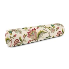 a large roll pillow with floral designs on the front and back side, sitting on a white background