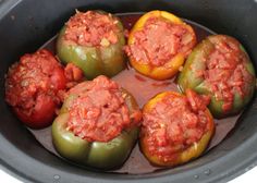 crock pot stuffed peppers in a slow cooker with the words crock pot stuffed peppers