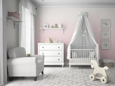 a baby's room is decorated in white and gray