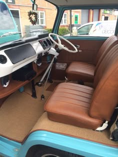 the interior of an old car with leather seats