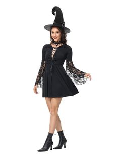 a woman wearing a black dress and witch hat