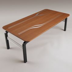 a wooden table sitting on top of a white floor next to a black metal frame