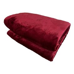 two red blankets sitting on top of each other