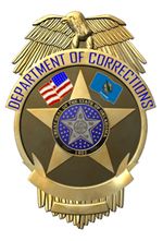 the department of correcting badge is shown